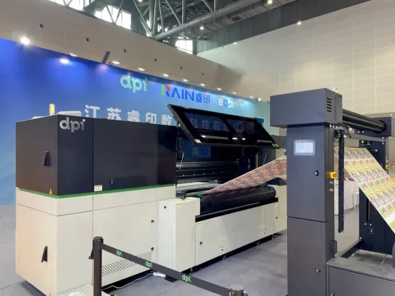 DPI NEO-TEX industrial textile printer operating at TSCI 2025